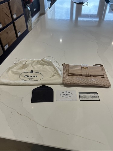 Discontinued prada bow - discontinued,